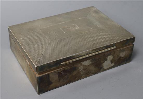 A 1930s engine silver cigarette box, 16cm.